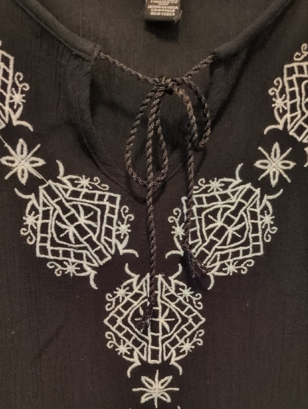 Black Long-Sleeve Top with White Embroidery